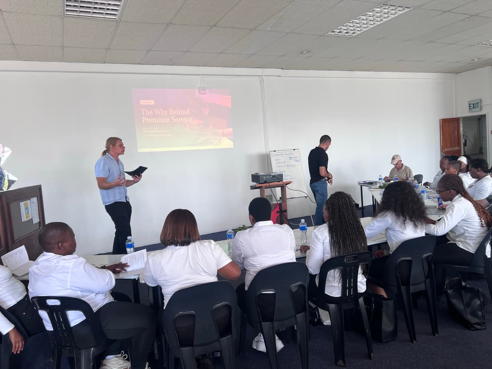 HirePro trainer presenting to a hospitality team at a venue